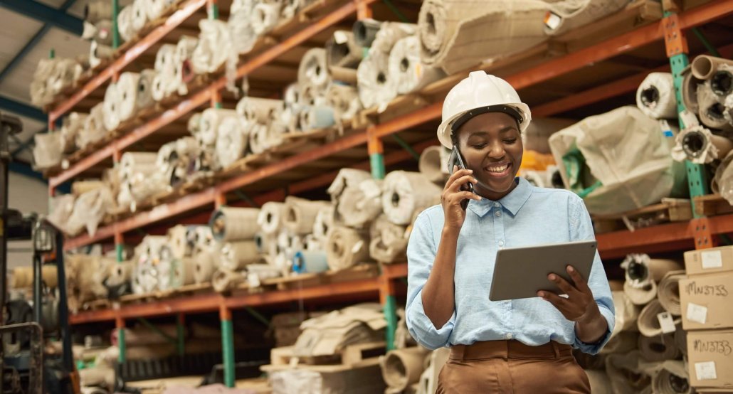 business owner working and smiling