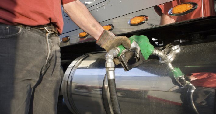 Filling up a truck with fuel