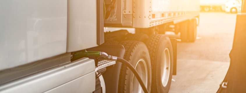 truck filling up fuel at station using fuel card