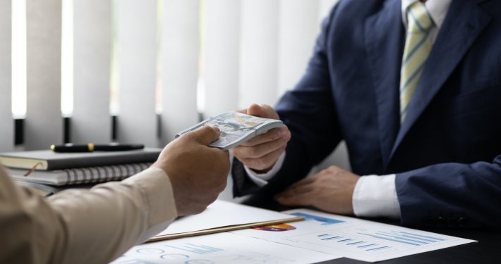 Handing Over Cash Advance