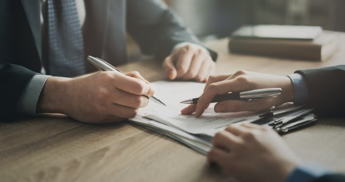 business owners refinancing an mca loan